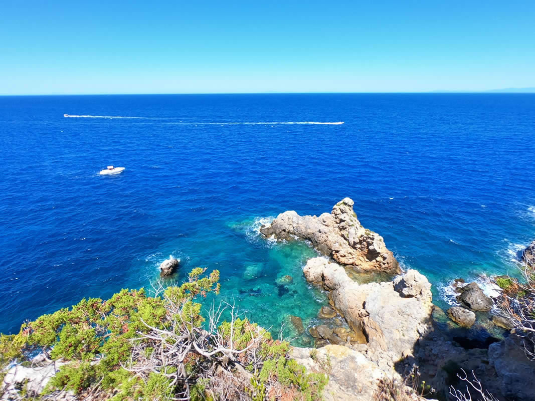 Boat cruising along the Argentario coast